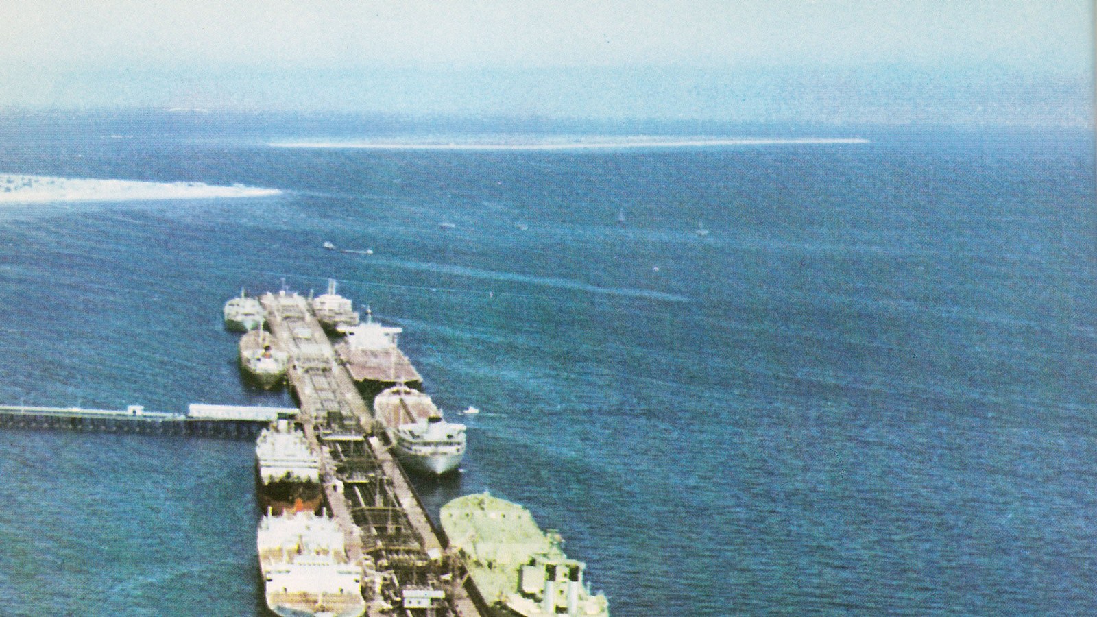 Archive photograph of the Kharg Island oil-loading terminal and tankers at berth. Not a picture of the 8 September 2026 strikes.