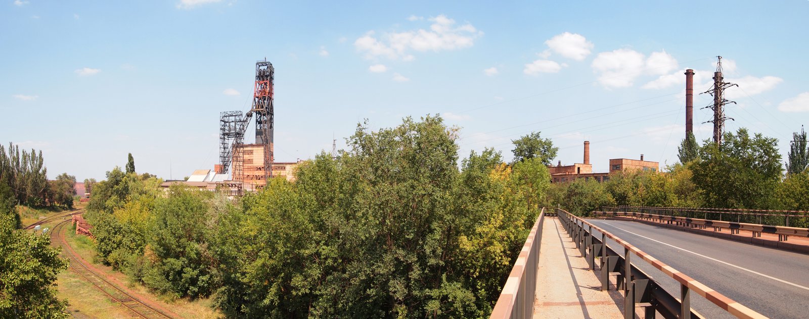 Archival Kryvyi Rih cityscape near industrial area, 11 Aug 2013 — location plate only, not strike-day imagery.