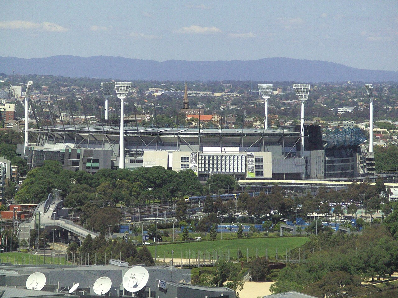 Melbourne Cricket Ground viewed from the city — archival venue still, 17 November 2010. Not game-day NFL imagery. PREP plate only.