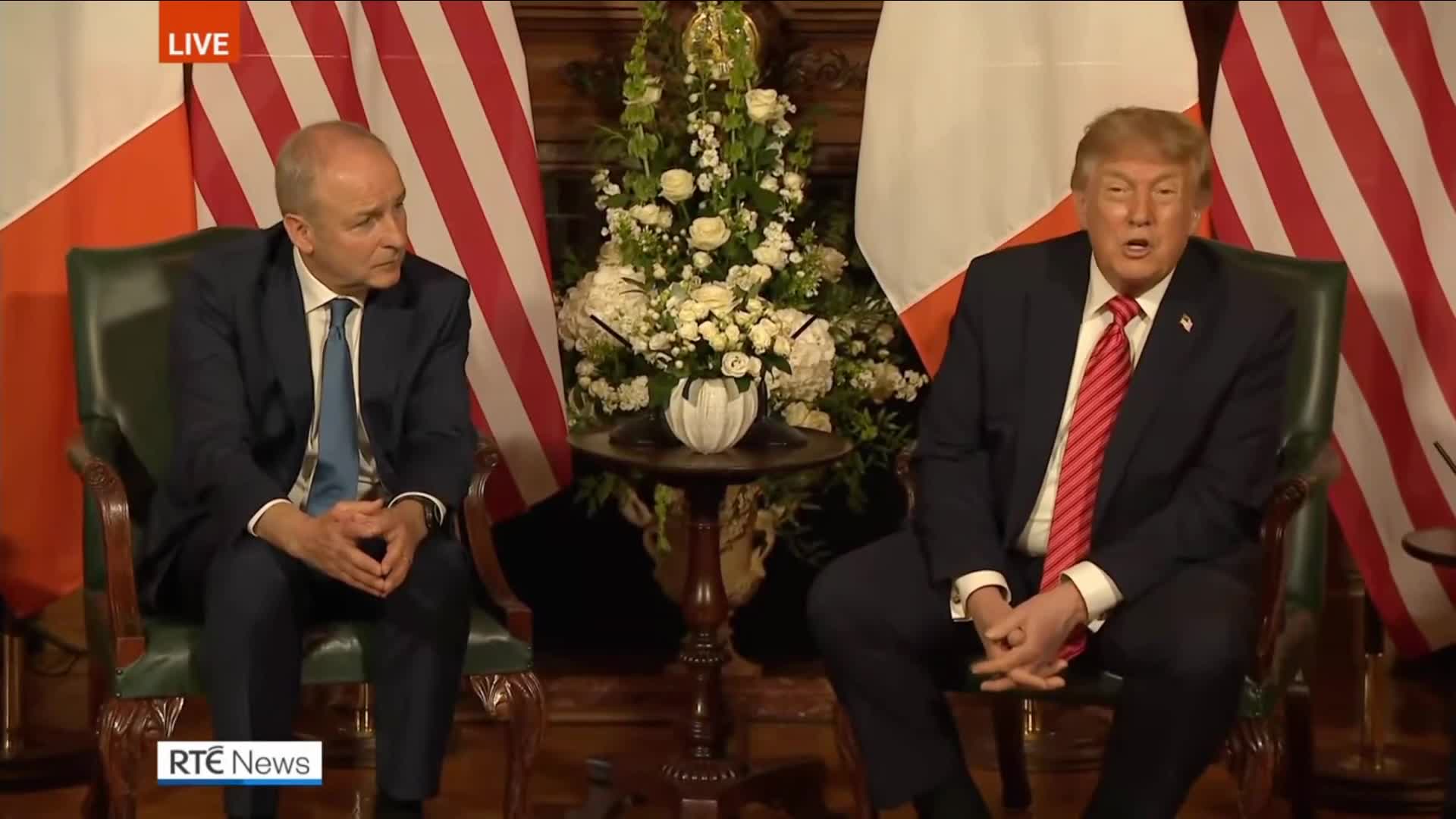 RTÉ News pool still — President Donald Trump seated with Irish counterpart Micheál Martin in Dublin, Sat 12 Sep 2026 bilateral; LIVE badge and RTÉ News logo visible. Archival meeting still — not proof of the attributed Houthi quote from this file.